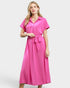 Woman wearing a pink dress on a white background
