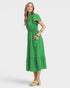 Woman wearing a green dress on a white background