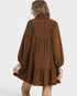 Brown dress worn by a person on a white background
