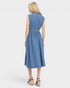 Woman wearing a blue dress on a white background