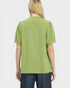 Person wearing a green blouse with short sleeves on a white background
