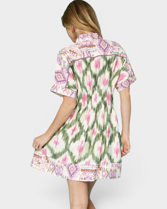 Woman wearing a floral dress on a white background