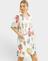 Woman wearing a floral dress on a white background