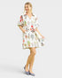 Woman wearing a floral dress on a white background