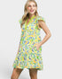 Woman wearing a colorful floral dress on a white background