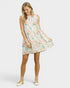 Woman wearing a floral dress on a white background