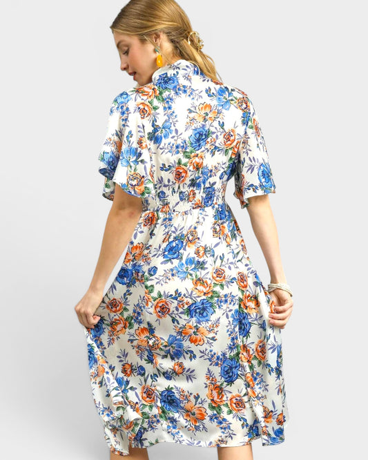 Woman wearing a floral dress with a white background