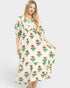 Woman wearing a floral dress on a white background