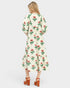 Woman wearing a floral dress on a white background