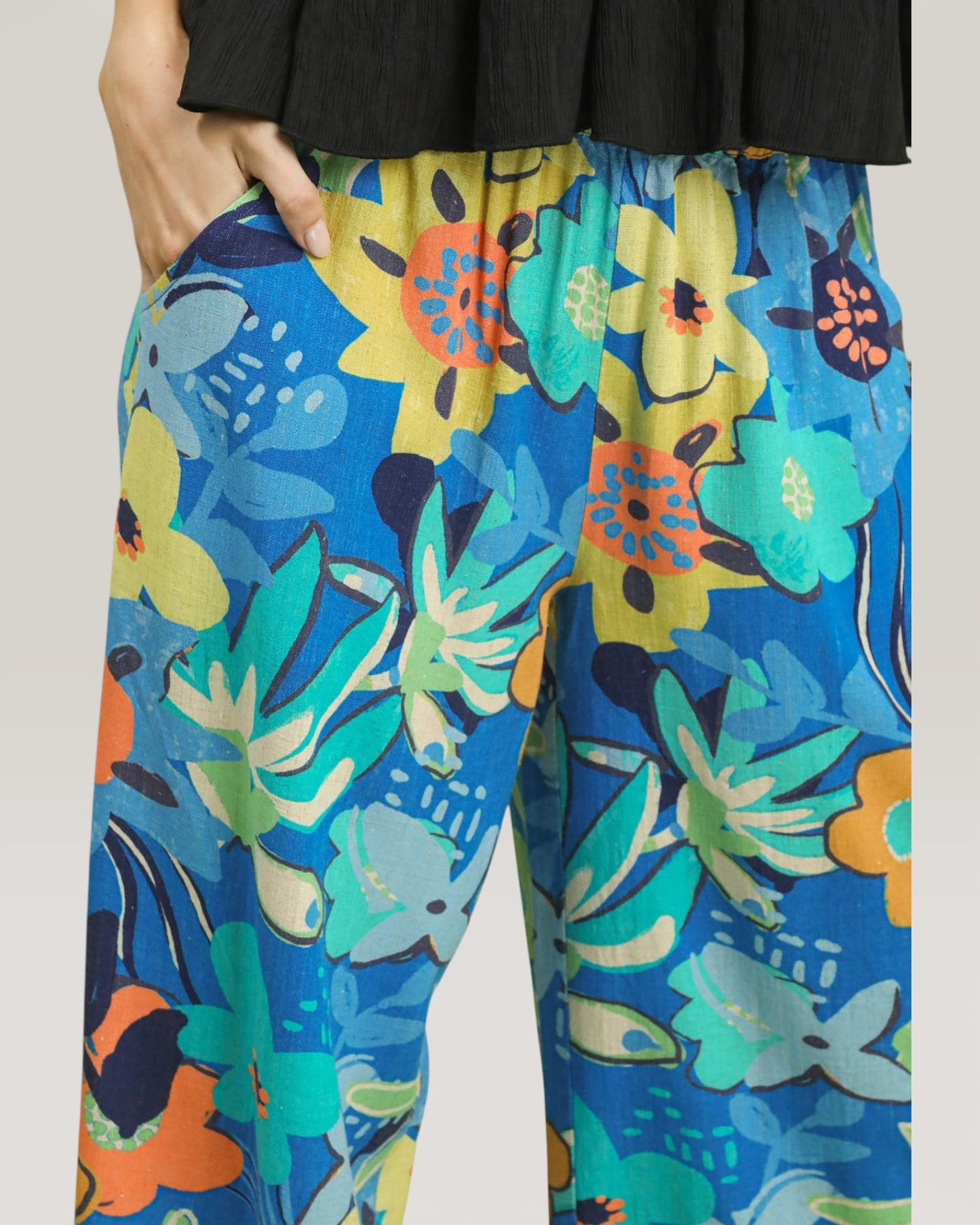 Colorful floral-patterned pants with a plain background