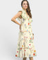 Woman wearing a floral dress on a plain background