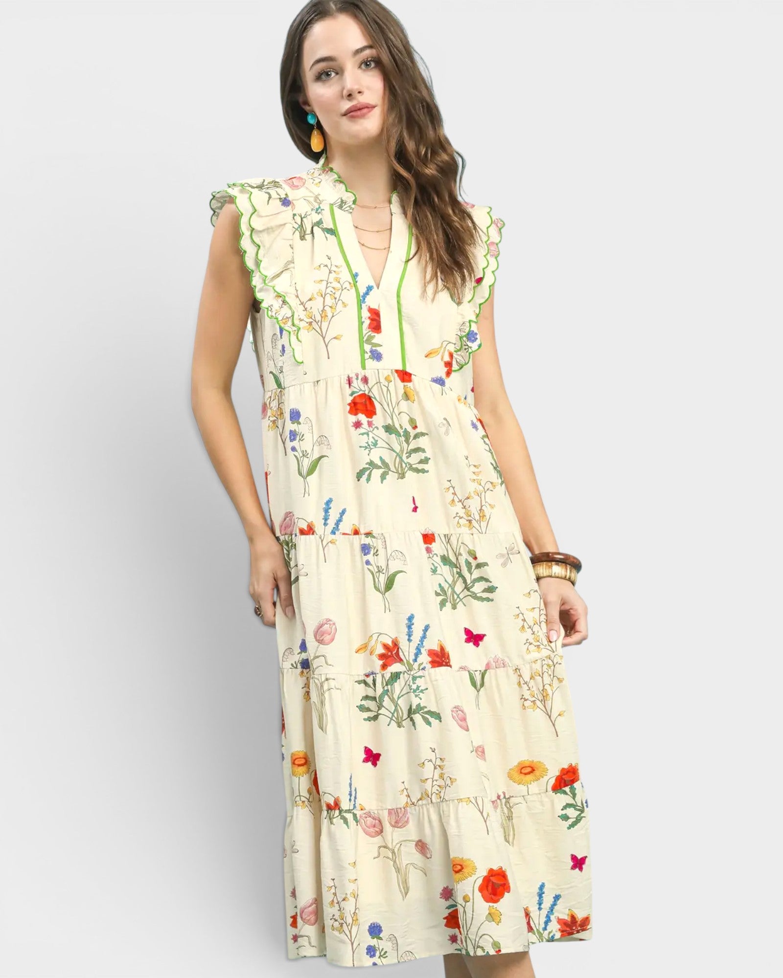 Woman wearing a floral dress on a white background