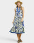 Woman wearing a floral dress with a white background