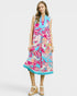 Woman wearing a colorful floral dress on a white background