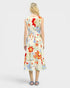 Woman wearing a floral dress on a white background