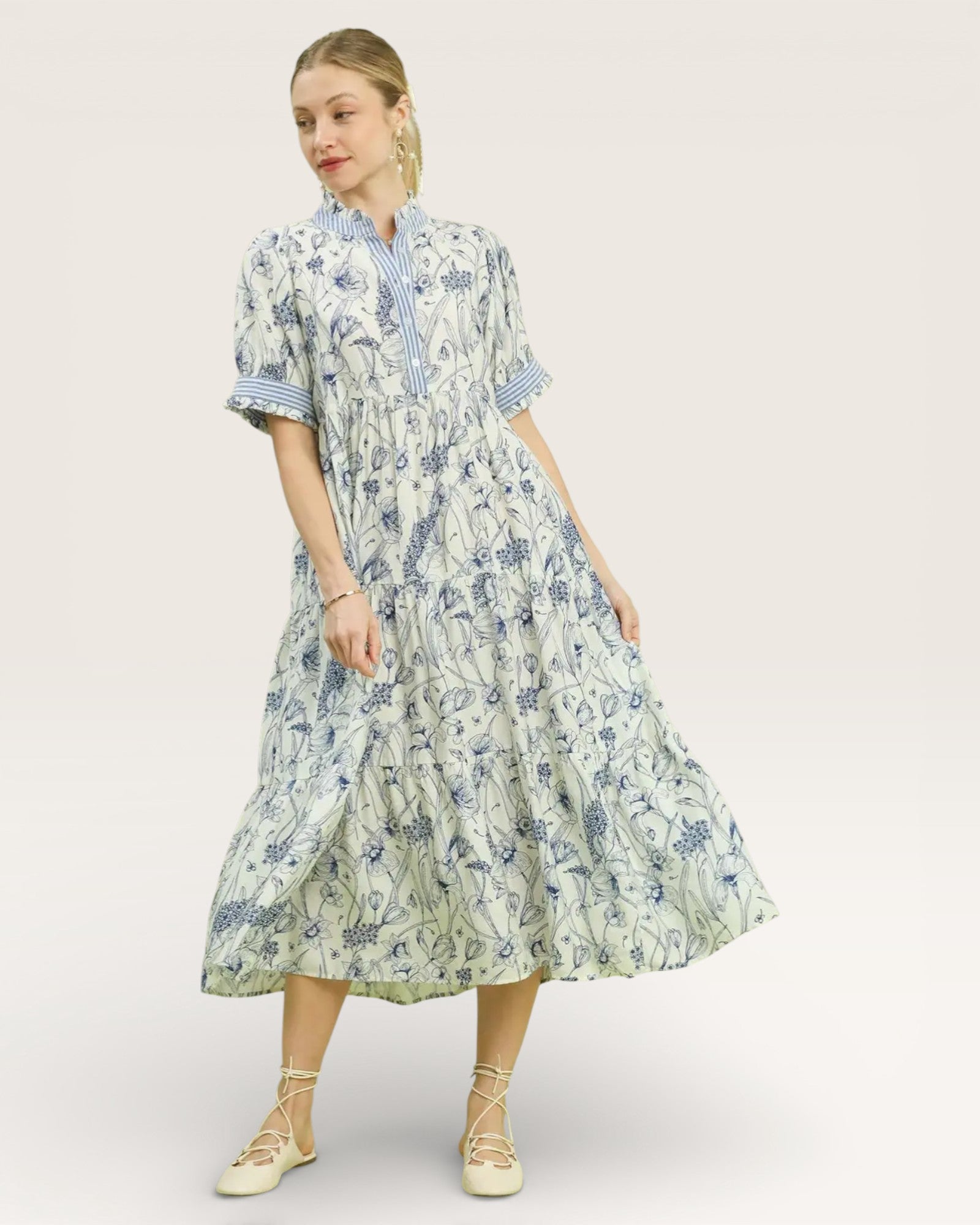 Woman wearing a floral dress on a white background