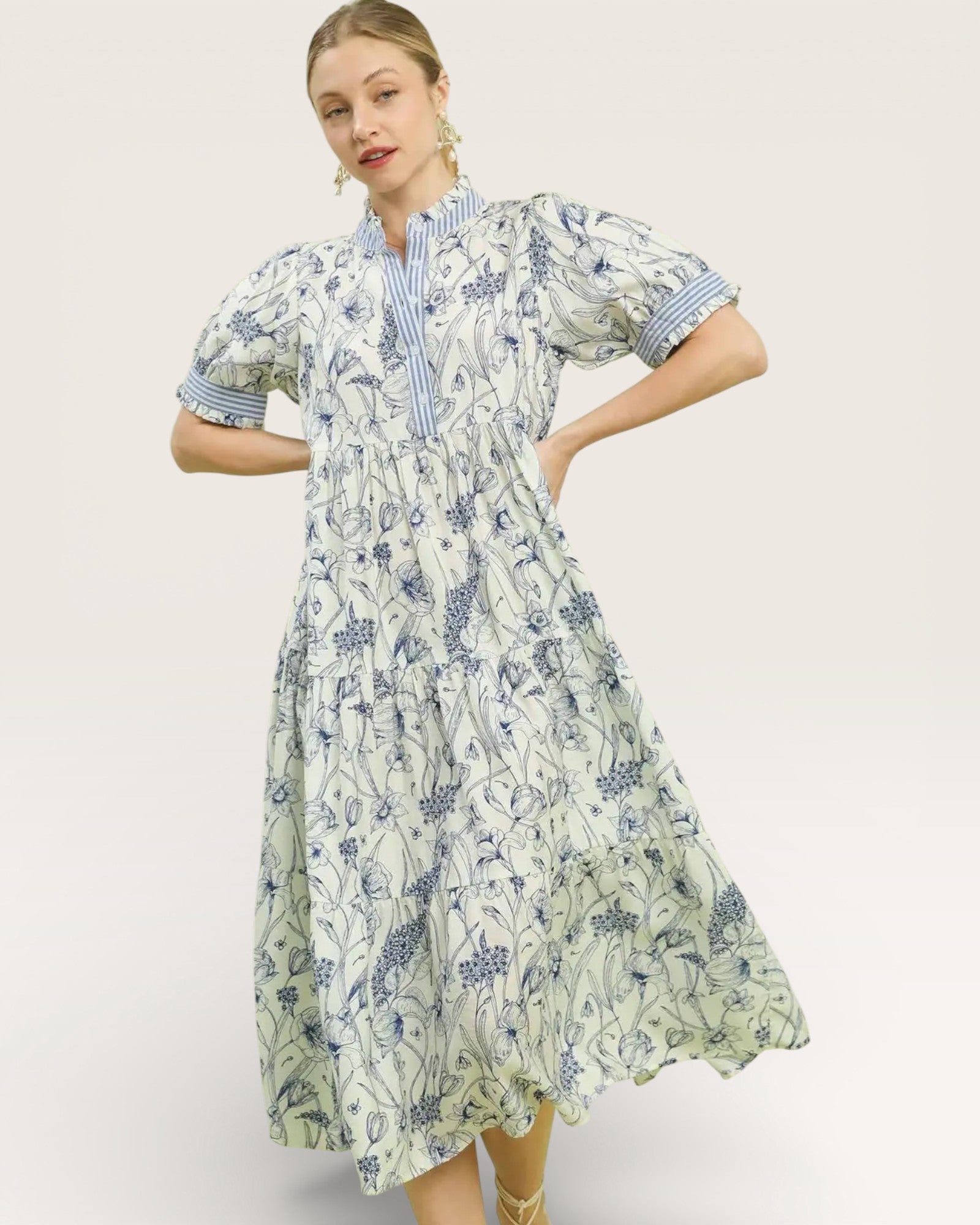 Woman wearing a floral dress with a white background