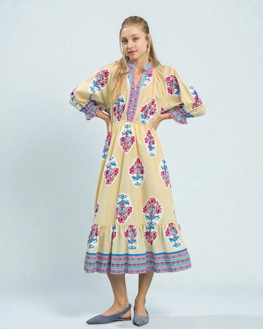 Woman wearing a floral dress on a white background