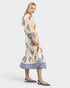 Woman wearing a floral dress on a white background