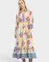 Woman wearing a floral dress with a white background