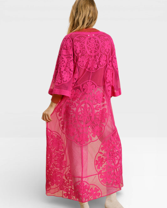 Pink lace dress on a white background