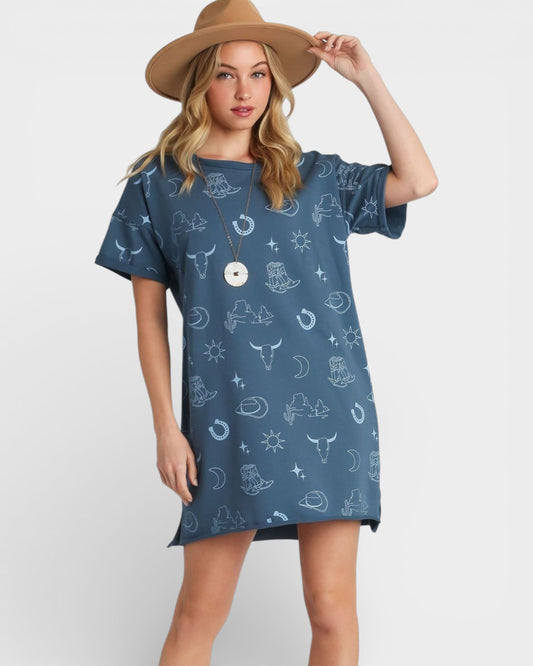 Woman wearing a blue patterned dress and brown hat on a white background