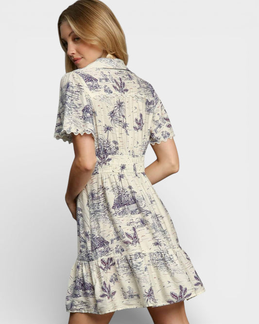 Woman wearing a floral dress on a plain background