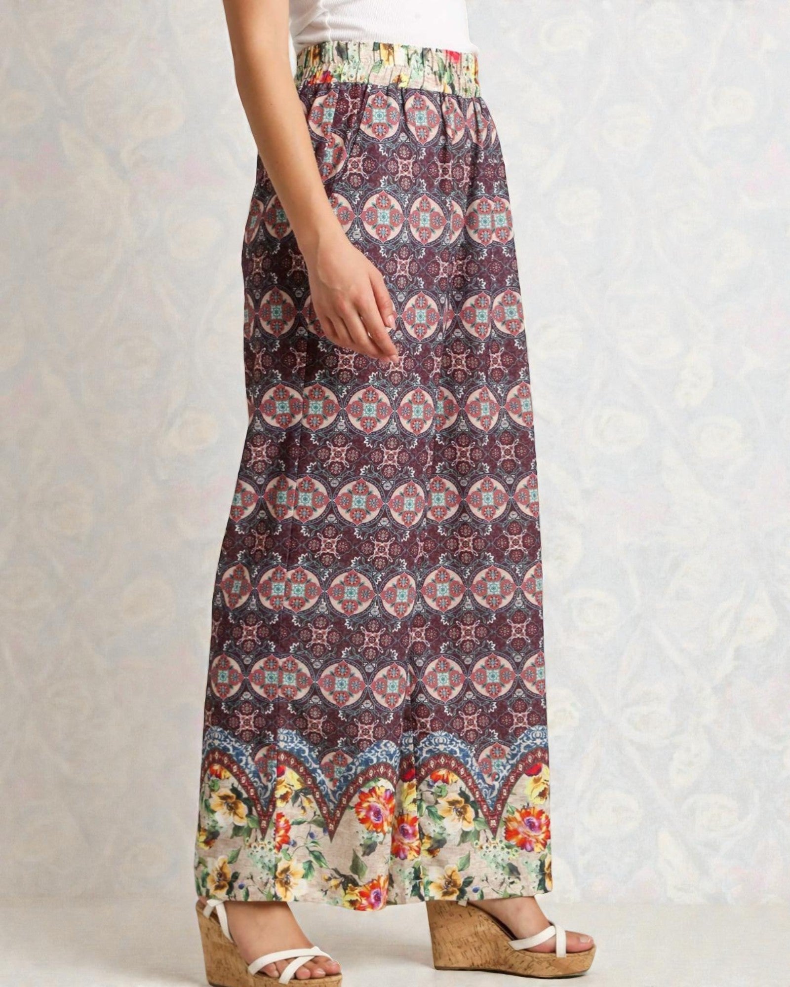 Patterned skirt with floral hem on a plain background
