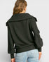 Person wearing a black jacket with a white background