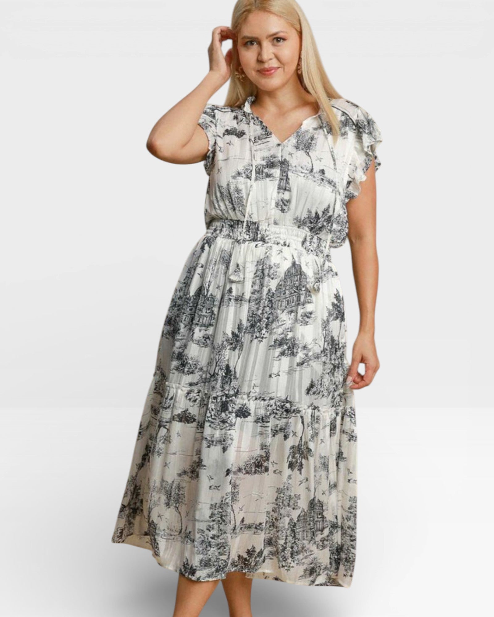 Woman wearing a floral dress on a white background