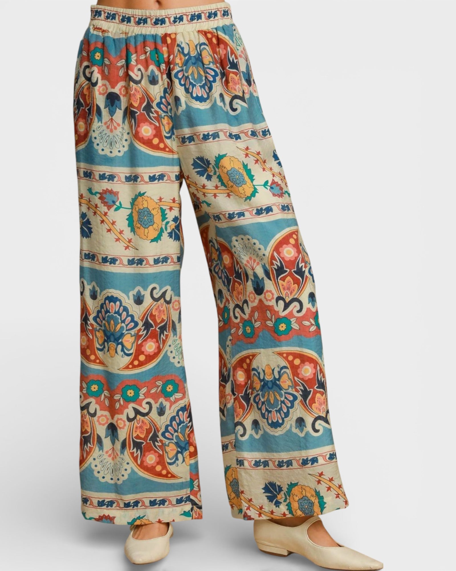Colorful patterned pants on a white background