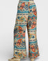 Colorful patterned pants on a white background