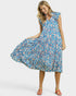 Woman wearing a blue floral dress on a white background