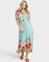 Woman wearing a floral dress on a white background