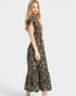 Woman wearing a floral dress on a white background
