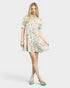 Woman wearing a floral dress on a white background