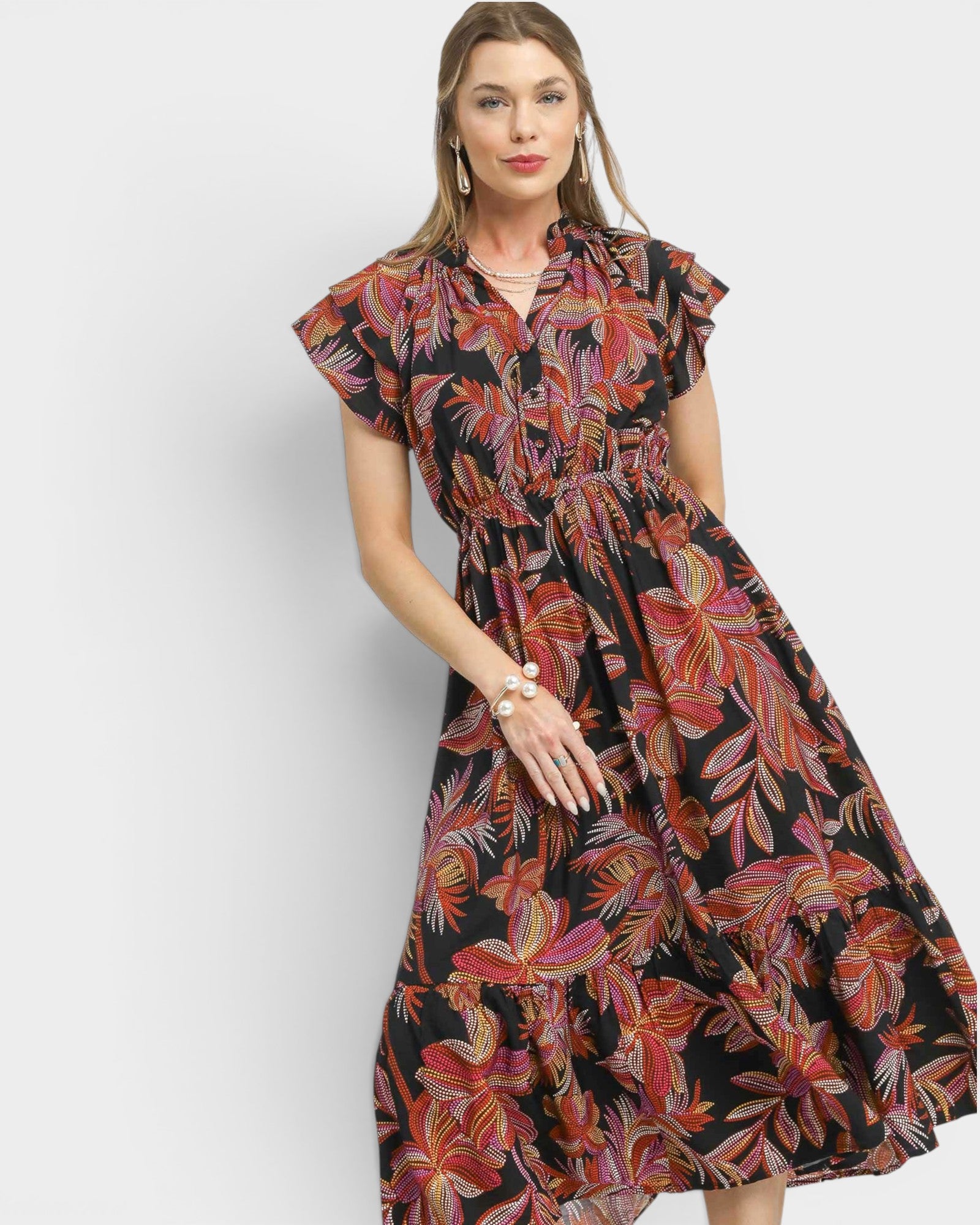 Woman wearing a floral dress on a white background