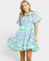 Woman wearing a floral dress on a white background