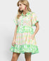 Woman wearing a floral dress on a white background