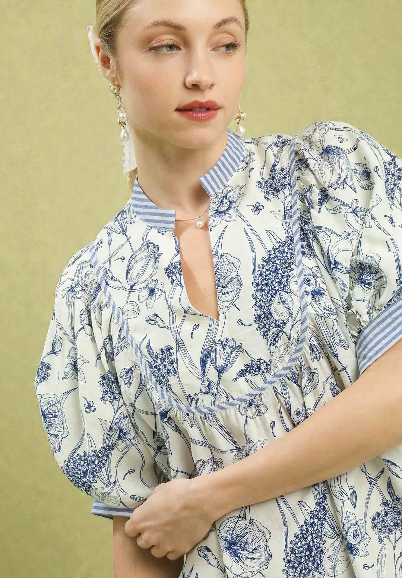 Woman wearing a floral dress with a beige background