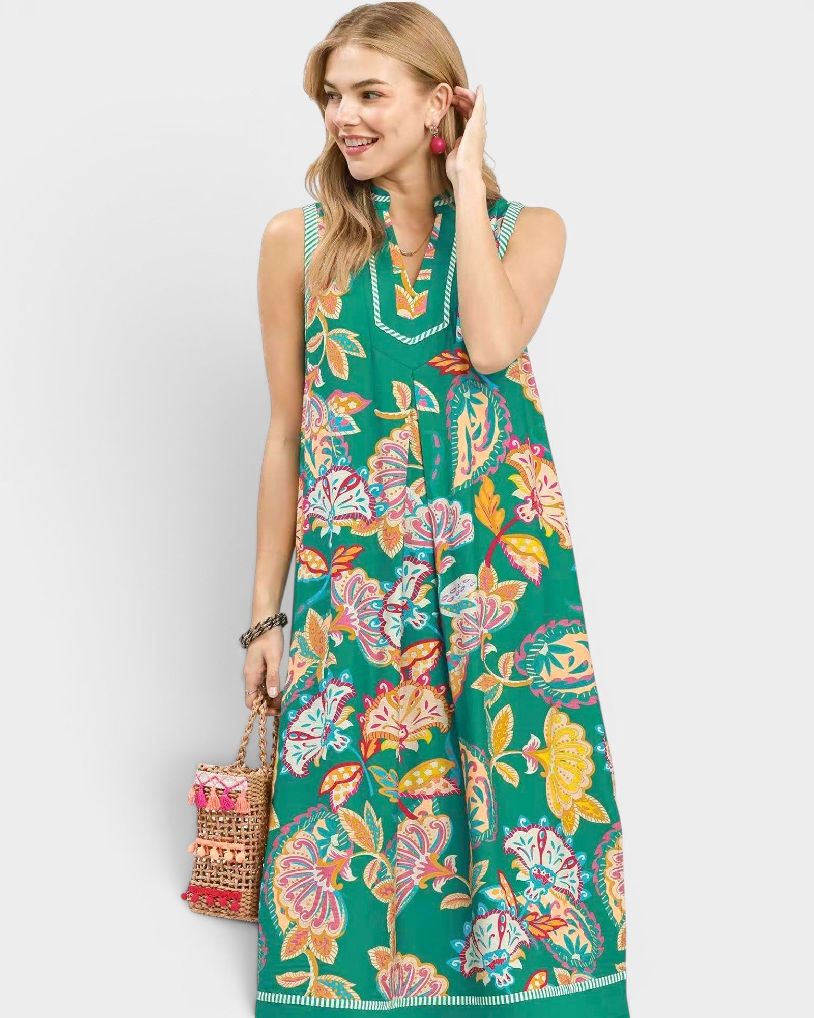 woman wearing green paisley floral midi dress