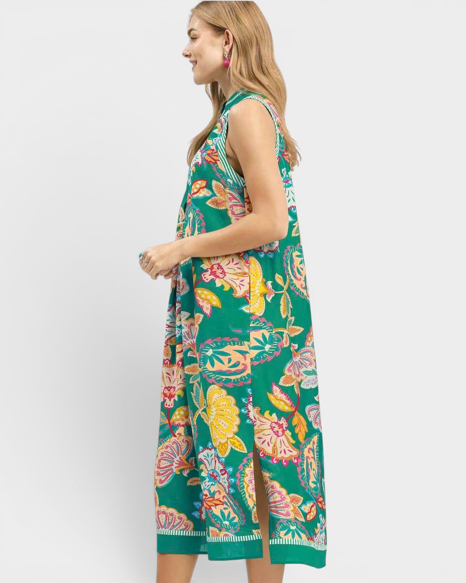 woman wearing green paisley floral midi dress