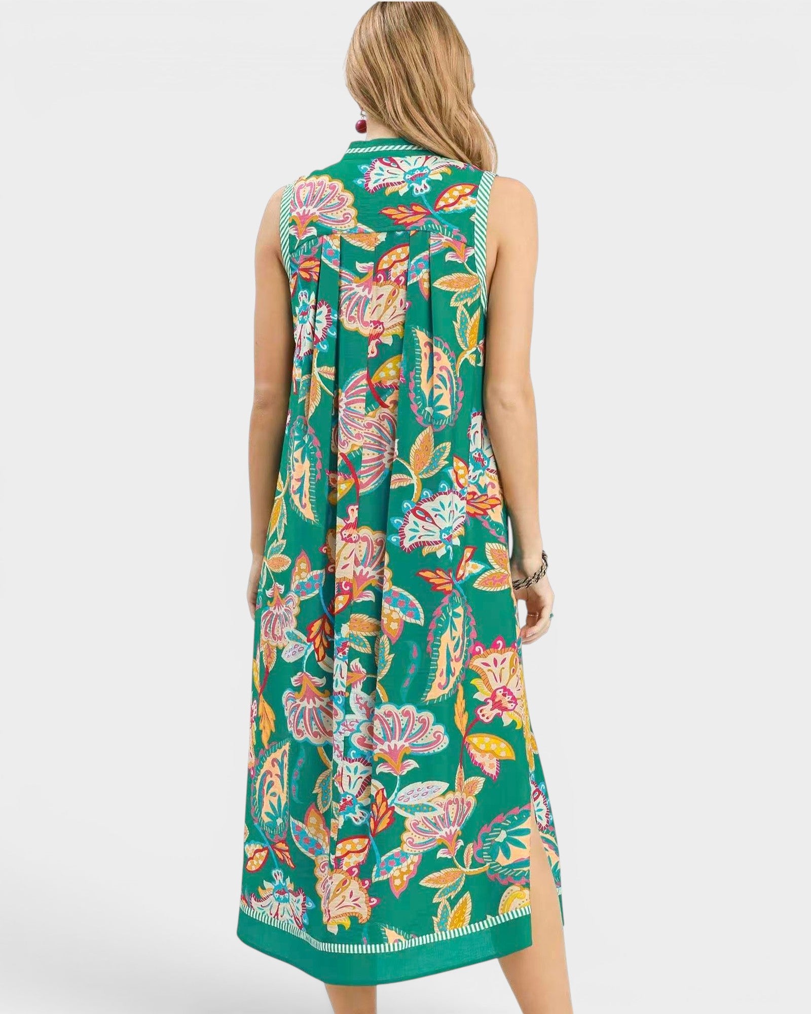 woman wearing green paisley floral midi dress