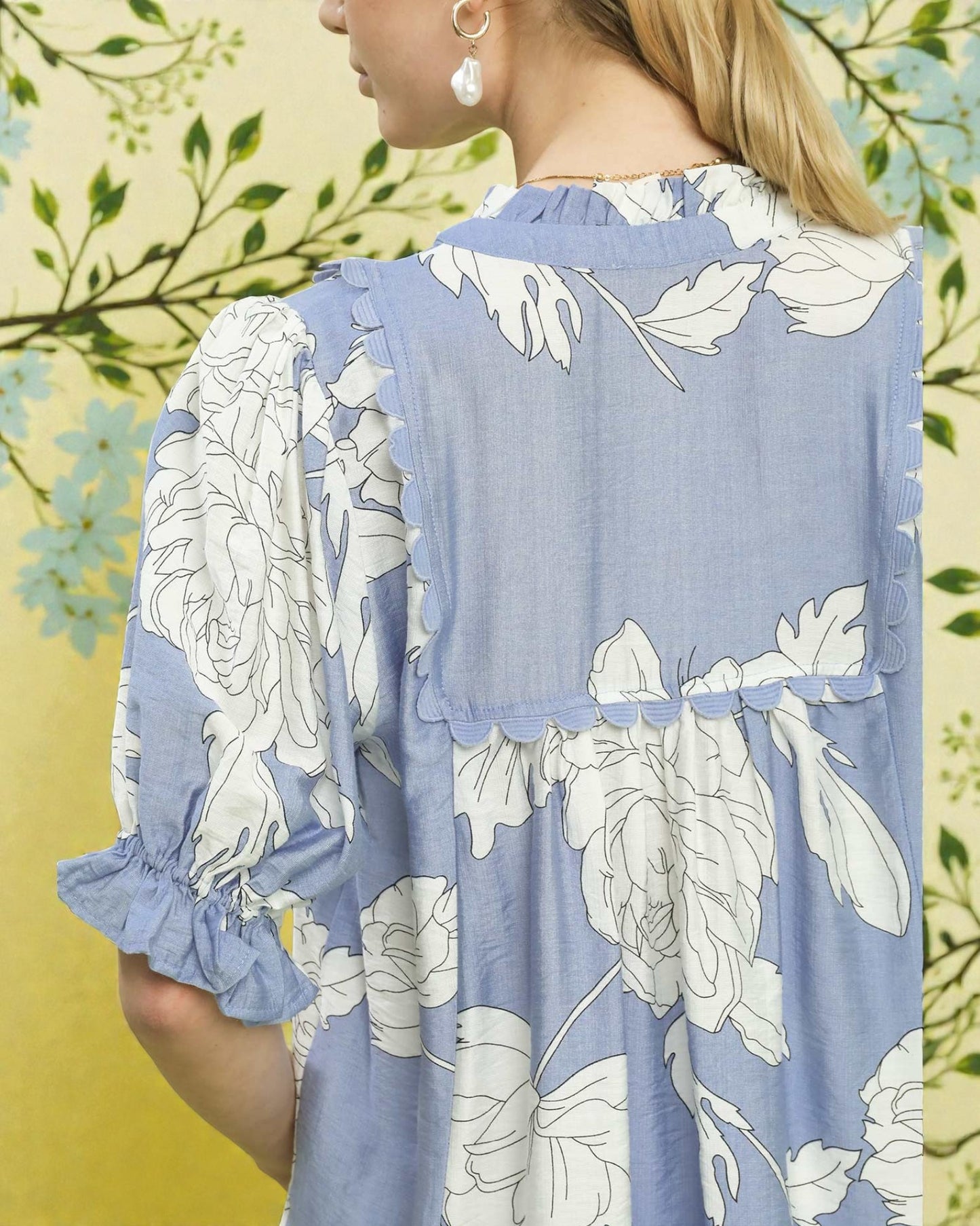 Blue floral dress with a yellow background