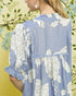 Blue floral dress with a yellow background