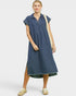 Woman wearing a blue striped dress on a white background