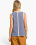 A woman shown from the back wearing a sleeveless knit top with vertical blue and cream stripes, paired with tan cargo pants, against a plain white studio background.