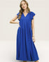 Woman wearing a blue dress on a white background