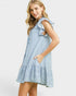 Woman wearing a blue and white striped dress on a white background