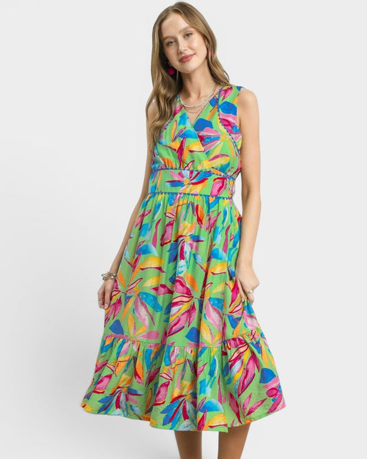 Woman wearing a colorful dress with a white background